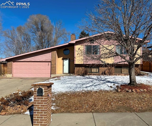 view of front of house with a garage