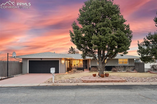 ranch-style home with a garage