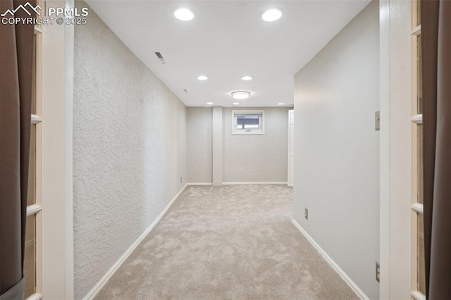 interior space with light colored carpet