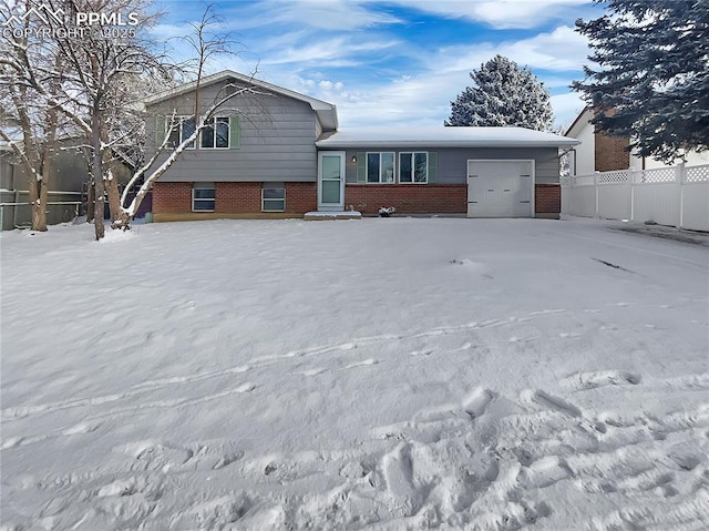 tri-level home featuring a garage