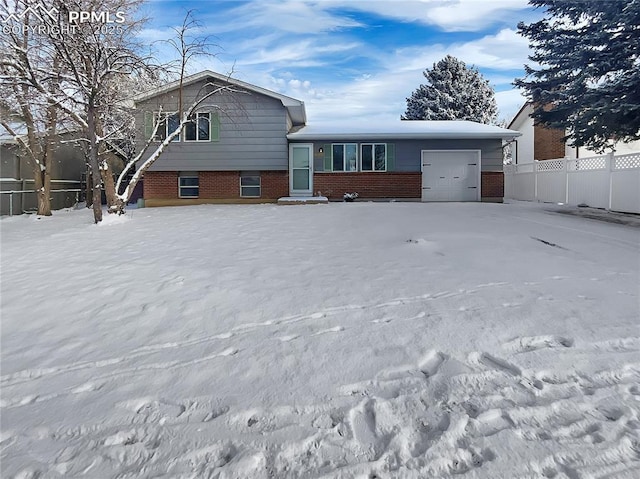 split level home featuring a garage