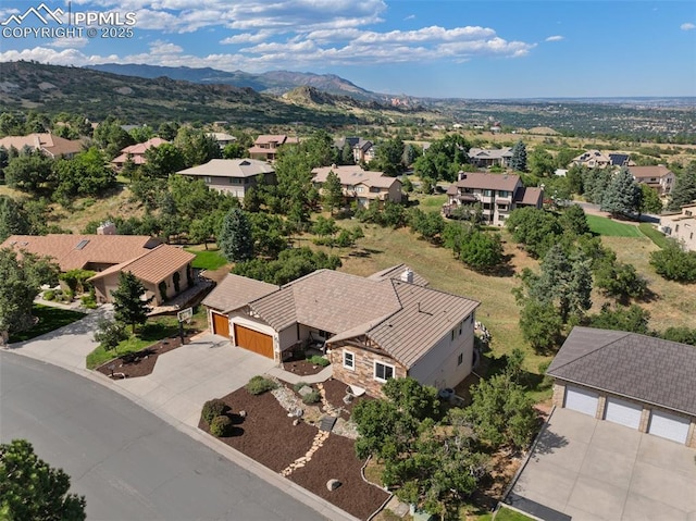 bird's eye view with a mountain view