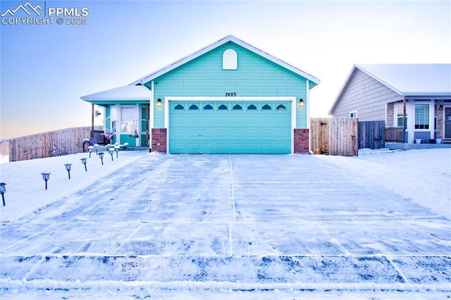 single story home featuring a garage