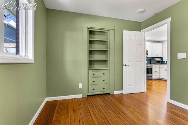 unfurnished bedroom featuring light hardwood / wood-style flooring