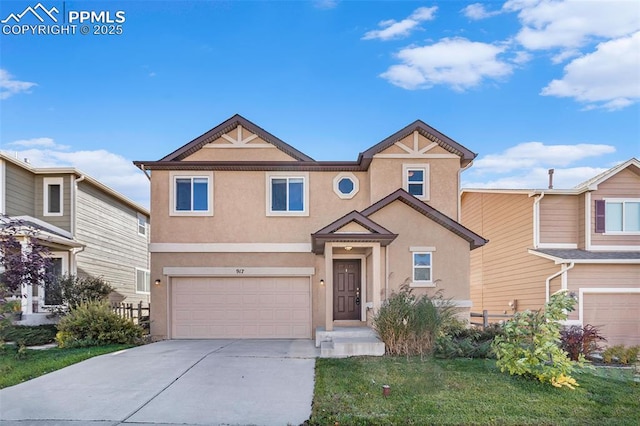 view of front of home featuring stucco siding, driveway, and an attached garage