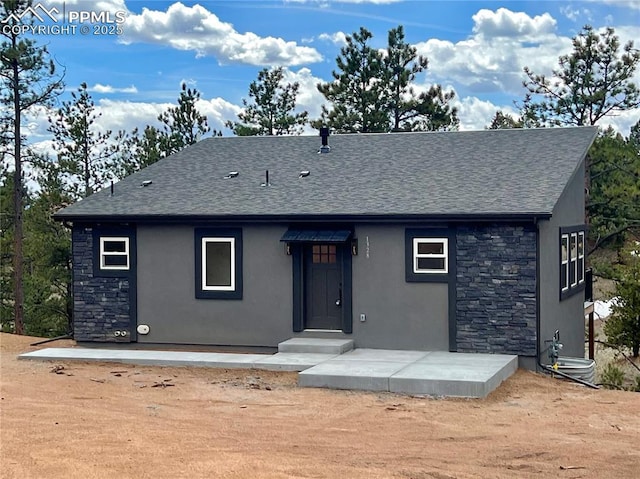 rear view of house with a patio area