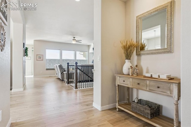 hallway featuring light hardwood / wood-style flooring