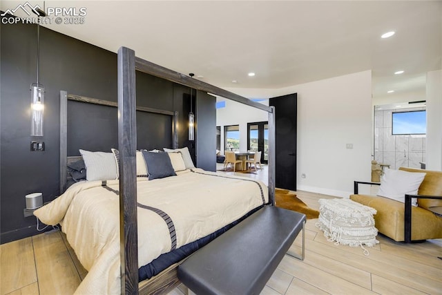 bedroom with light hardwood / wood-style floors