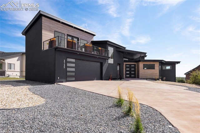 contemporary home featuring french doors and a balcony