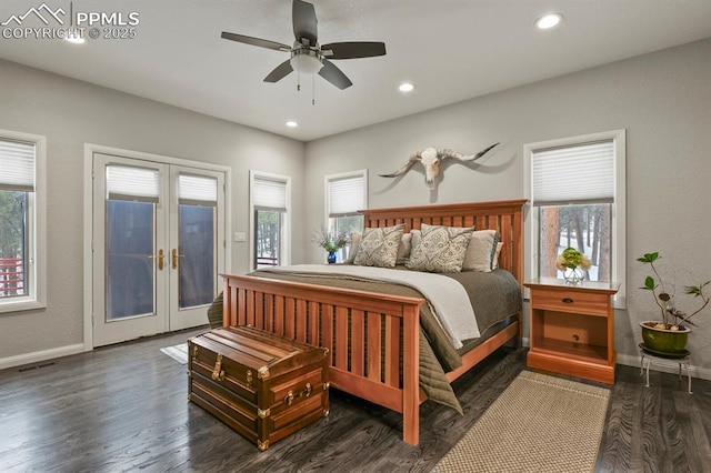 bedroom with access to outside, french doors, multiple windows, and dark wood-style flooring