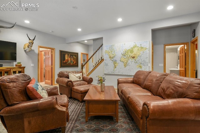 living room with recessed lighting and stairway