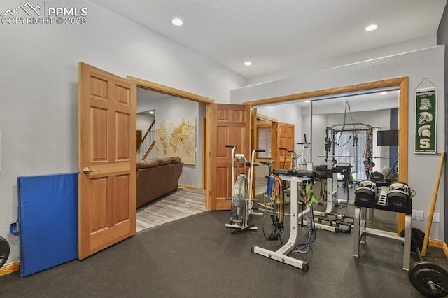 workout area with recessed lighting and baseboards