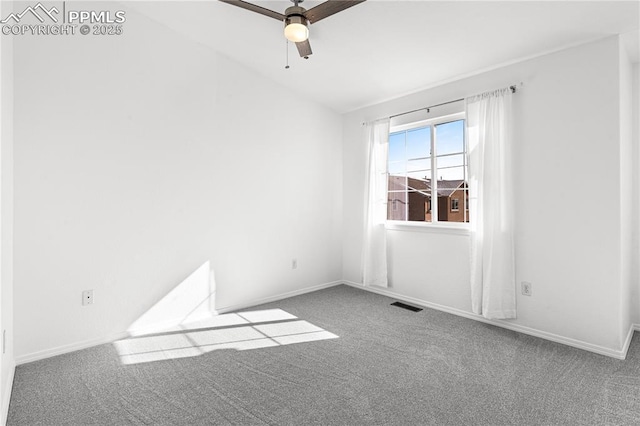 carpeted empty room featuring lofted ceiling and ceiling fan