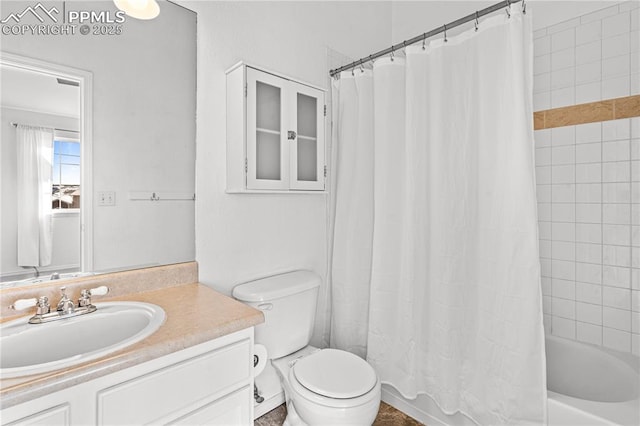 full bathroom featuring vanity, shower / bath combination with curtain, and toilet