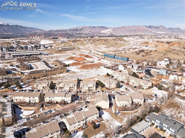 drone / aerial view featuring a mountain view