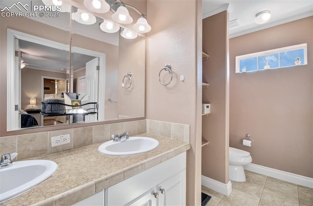 full bath featuring toilet, ensuite bath, ornamental molding, and a sink