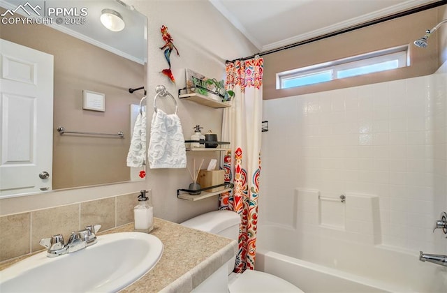 full bathroom featuring ornamental molding, vanity, toilet, and shower / bath combo with shower curtain