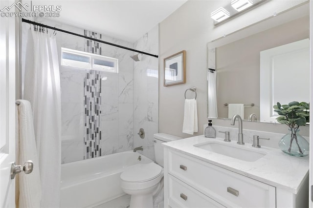 bathroom featuring marble finish floor, vanity, toilet, and shower / bath combo with shower curtain