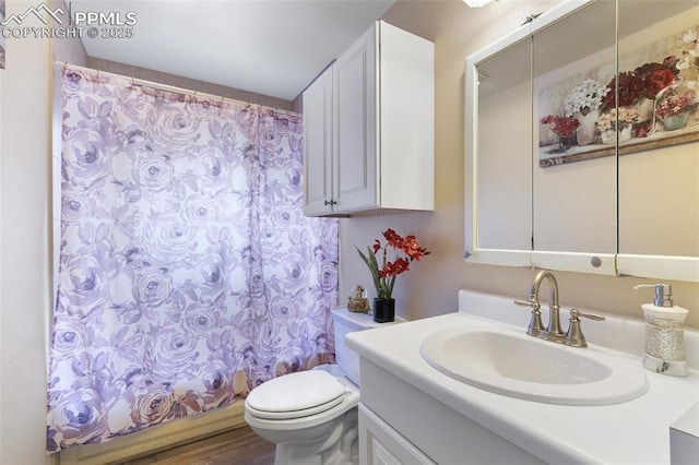 full bathroom with toilet, vanity, shower / bath combo with shower curtain, and wood finished floors
