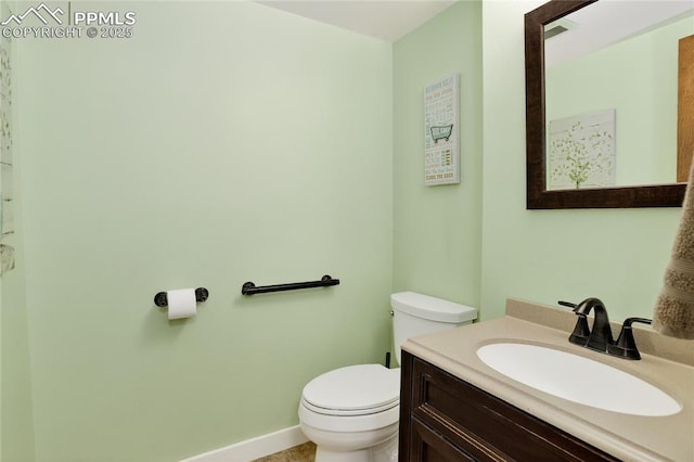 2113 Woodburn St, Colorado Springs, CO 80906 - bathroom featuring toilet and vanity