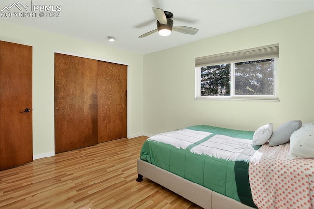 2113 Woodburn St, Colorado Springs, CO 80906 - bedroom with a closet, wood finished floors, and ceiling fan