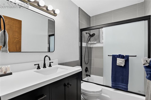 2113 Woodburn St, Colorado Springs, CO 80906 - full bath featuring vanity and shower / bath combination with glass door