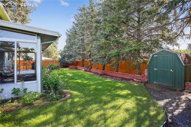 2113 Woodburn St, Colorado Springs, CO 80906 - fenced backyard featuring a storage shed and a sunroom