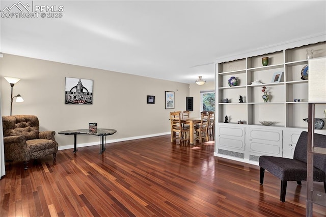 2113 Woodburn St, Colorado Springs, CO 80906 - living area featuring wood finished floors and baseboards