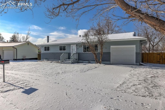 ranch-style home with a garage