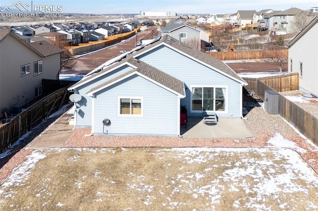 back of house with a patio area