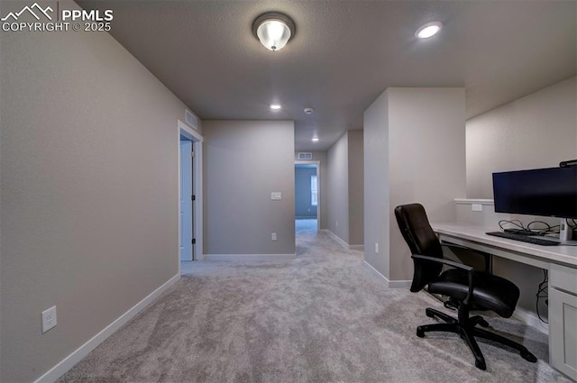 office space with light carpet, recessed lighting, visible vents, and baseboards