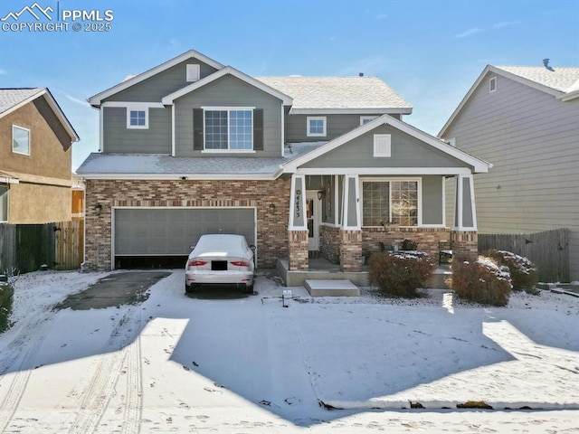 craftsman-style home featuring a garage and covered porch