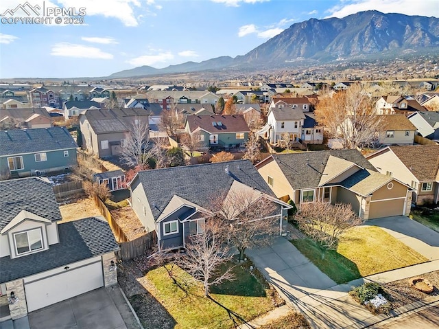 bird's eye view with a residential view and a mountain view