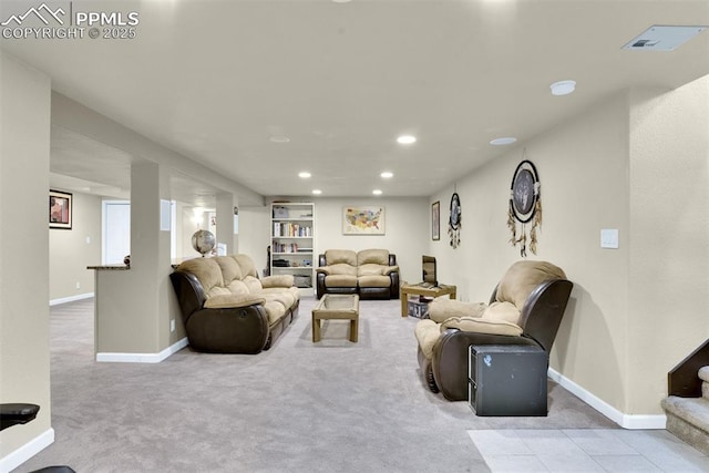 living room featuring stairway, baseboards, visible vents, and recessed lighting