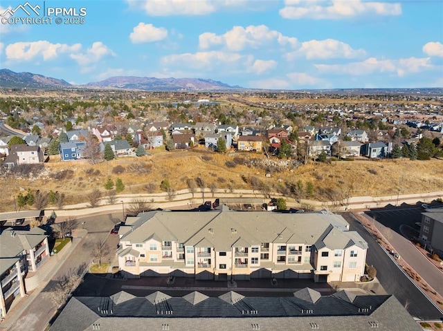 bird's eye view featuring a residential view and a mountain view