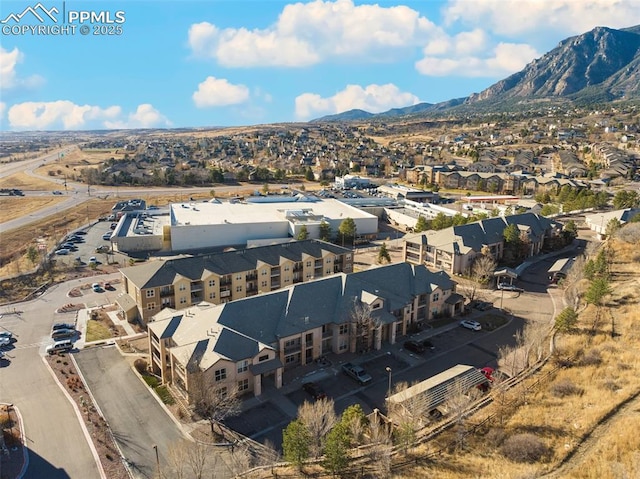 aerial view with a residential view and a mountain view