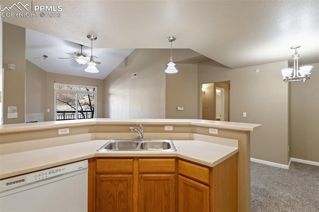 kitchen with light countertops, white dishwasher, a sink, and light colored carpet