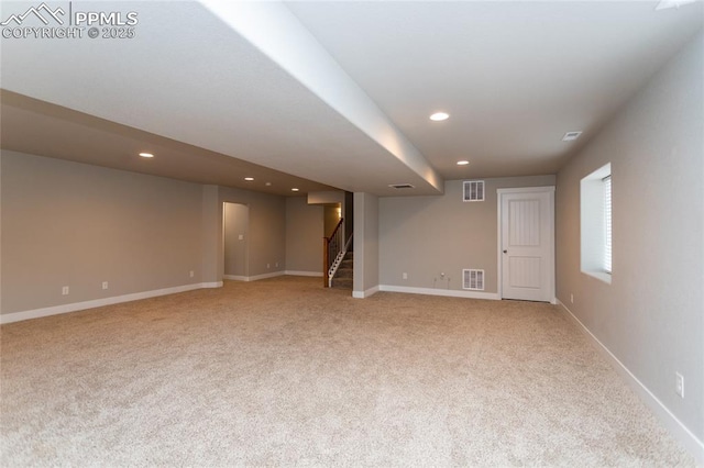 basement with light carpet