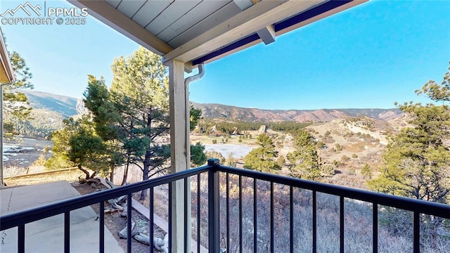 balcony featuring a mountain view