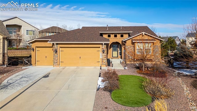 view of front of home with a garage, driveway, roof with shingles, and stone siding