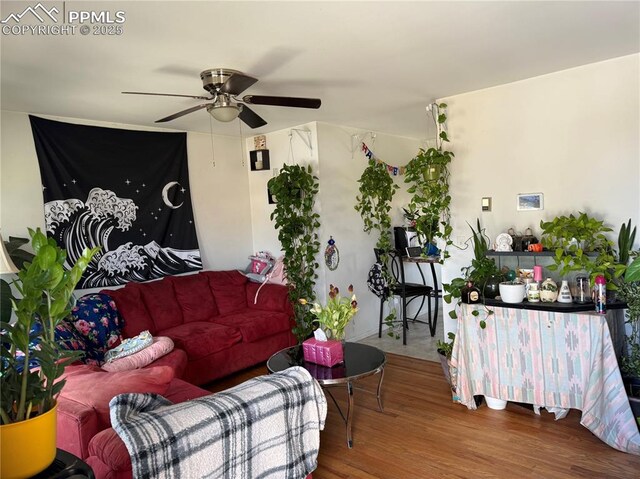2106 Capulin Dr, Colorado Springs, CO 80910 - living area with wood finished floors and ceiling fan