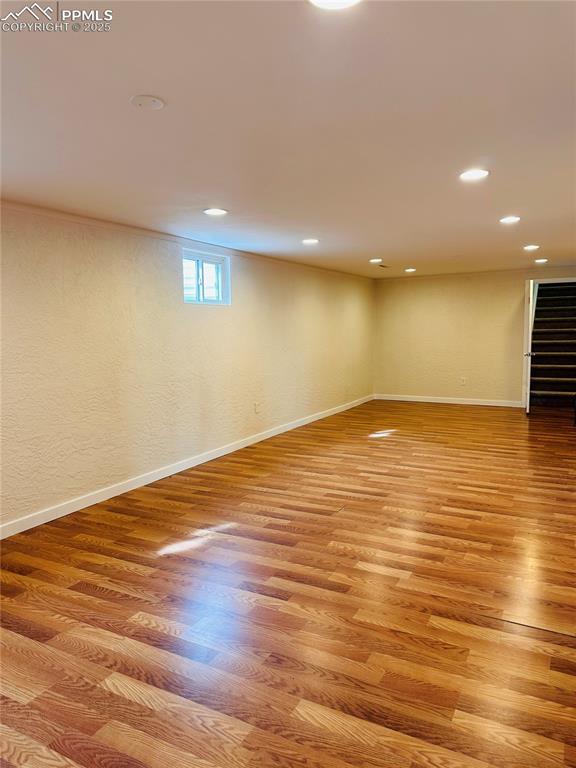 basement featuring light hardwood / wood-style flooring