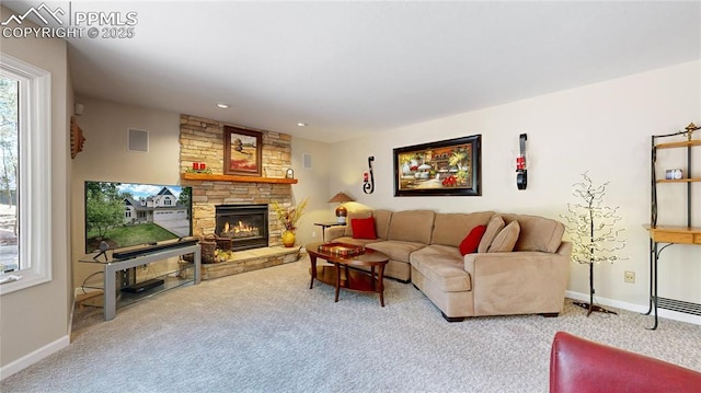 living room featuring carpet floors and a fireplace