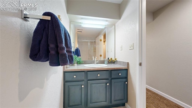 bathroom featuring vanity and walk in shower