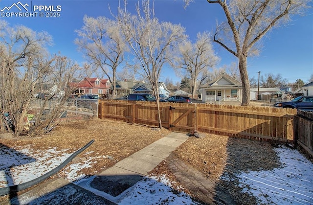 view of yard covered in snow