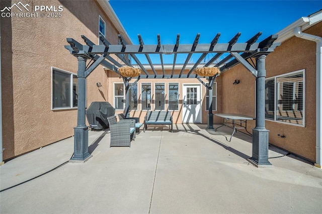 view of patio featuring outdoor lounge area, a grill, and a pergola