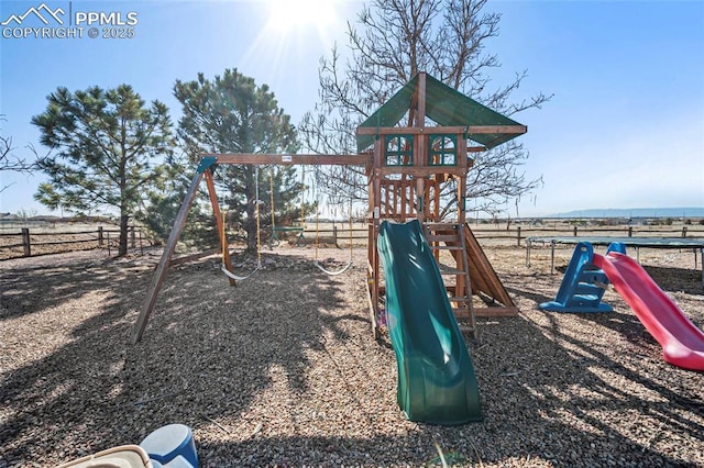 view of play area featuring fence