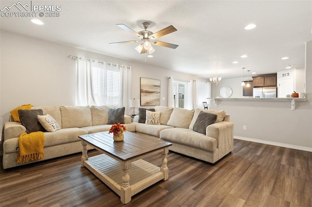 living area featuring dark wood-style floors, baseboards, and recessed lighting