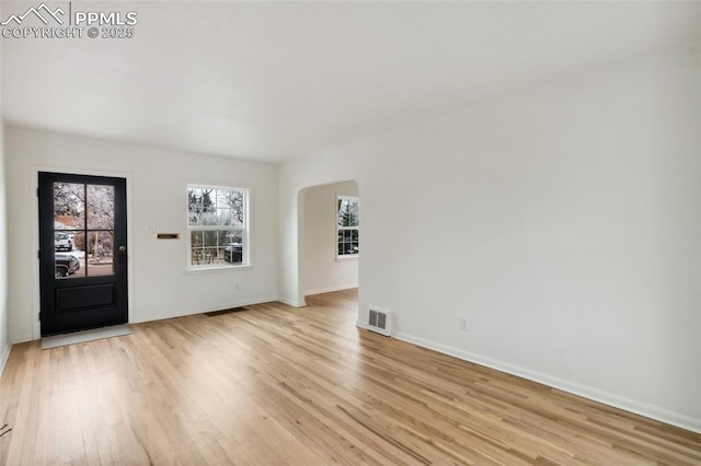 foyer entrance featuring light wood-type flooring