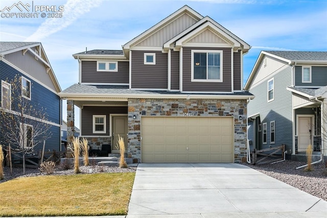 craftsman inspired home with a porch, an attached garage, concrete driveway, stone siding, and board and batten siding